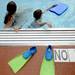 Buhr Park Shark swimmers participate in a swimathon to raise funds for Ann Arbor Active Against ALS and Bob Schoeni at the Buhr Park Pool on Wednesday morning. The event lasted four hours starting at 7:30 a.m. Melanie Maxwell | AnnArbor.com